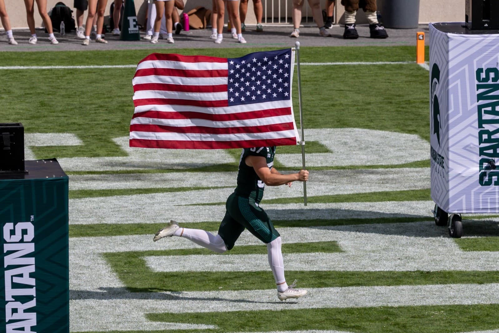 Kindred spirits: At Michigan State, Pat Fitzgerald and Tom Izzo share a reverence for those who serve article image about Michigan State Football