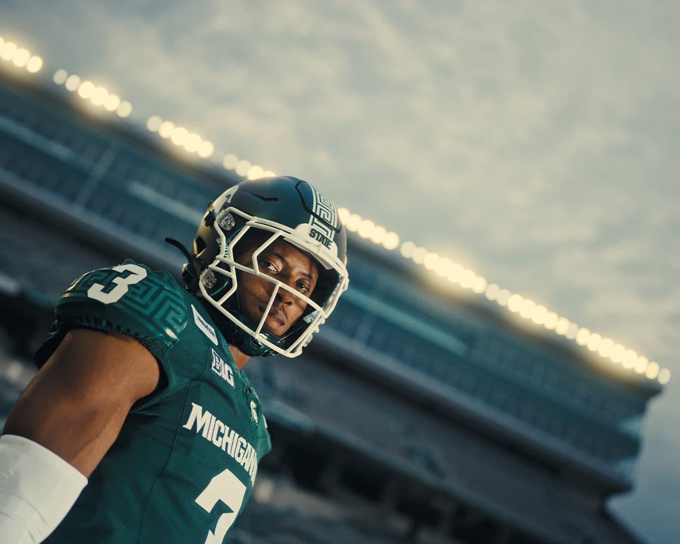 EXCLUSIVE: Fan feedback led MSU to move MSUFCU logo from front of football helmet