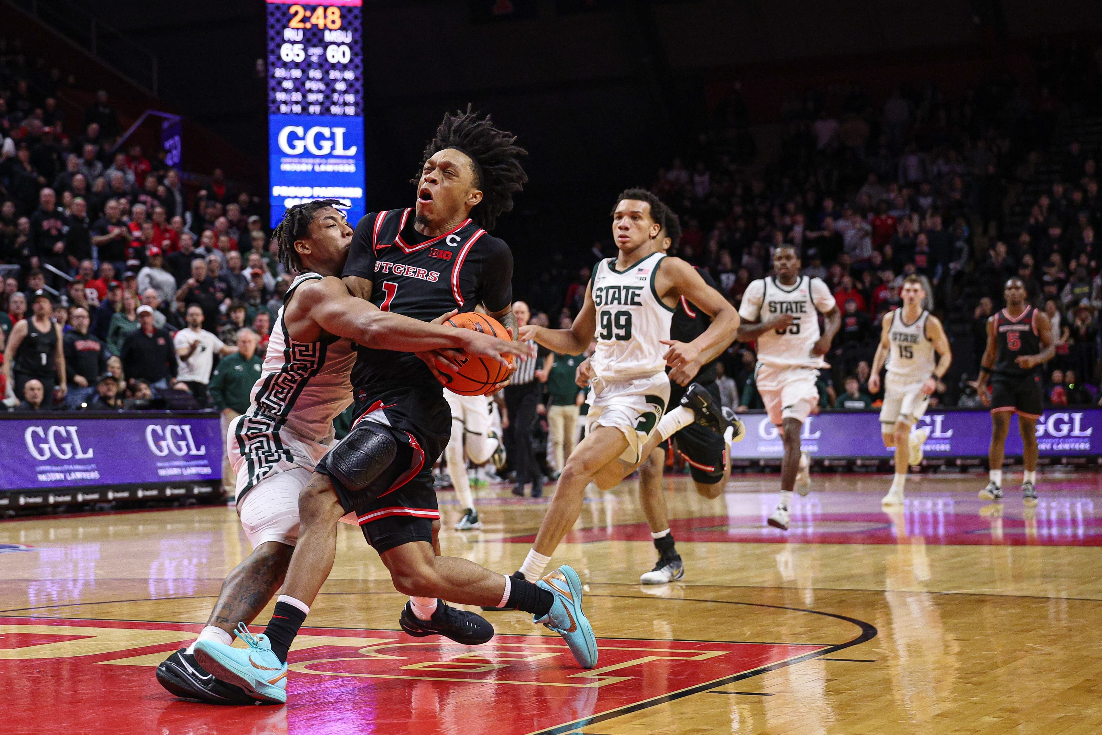 MSU finds a way at Rutgers, wins 88-79 in OT, grabs share of first place article image about Michigan State Basketball