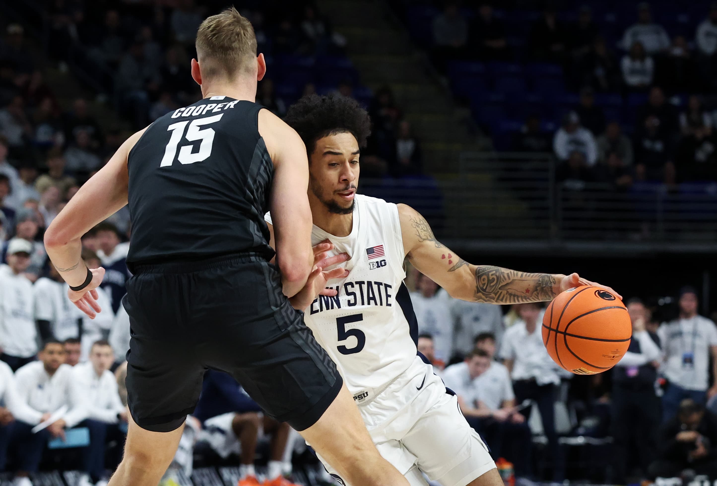 Michigan State unleashes Divine Ugochukwu in narrow 76-72 win at Penn State article image about Carson Cooper
